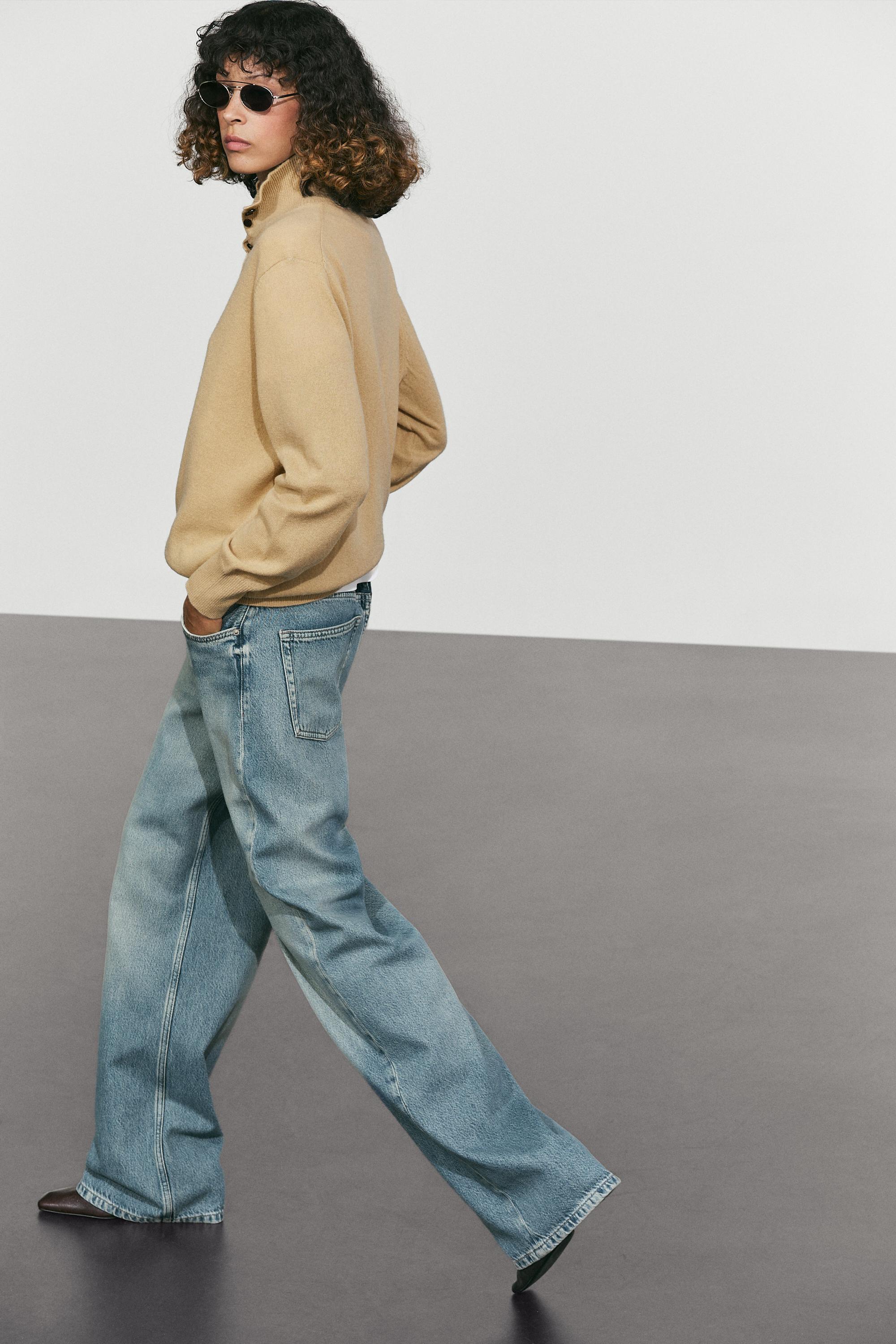 High neck knit sweater with button detail